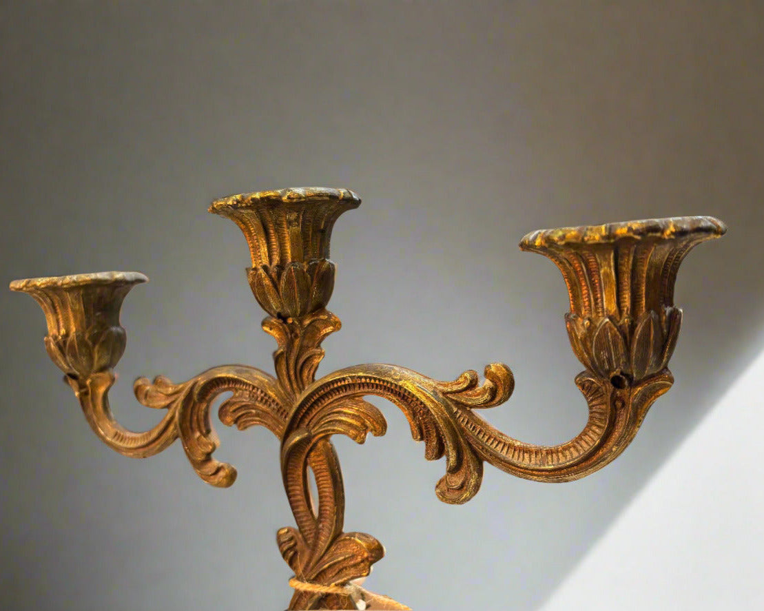 Vintage brass candleholder with bronze and gold finish, holds three candles, ornate decorative design