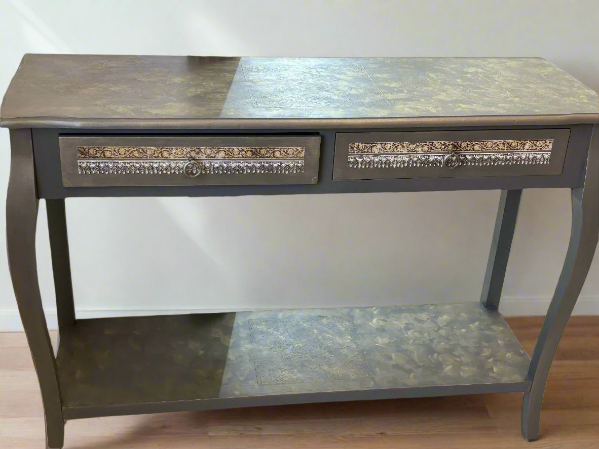 Refurbished vintage console table with a distressed wood finish and ornate carvings, perfect for adding character to entryways or living rooms. This stylish table combines classic design with modern functionality, making it ideal for displaying decor or as a chic storage solution.